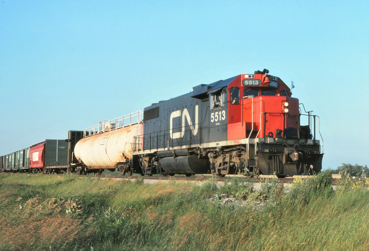 CN GP38-2, 5513, leads a short transfer job back to Toronto Yard on July 15, 1976.