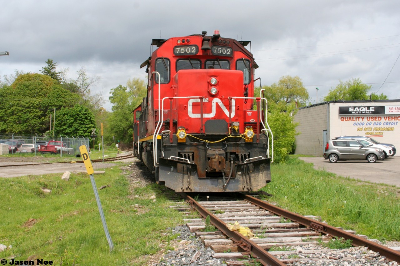 On an otherwise overcast spring afternoon, former CN hump yard GP38-2’s 7502 and 7512 are viewed during a lucky sunny break assigned to CN L542 in Cambridge on the Fergus Spur. In fall 2022, this assignment’s origin was changed from Cambridge to Kitchener.