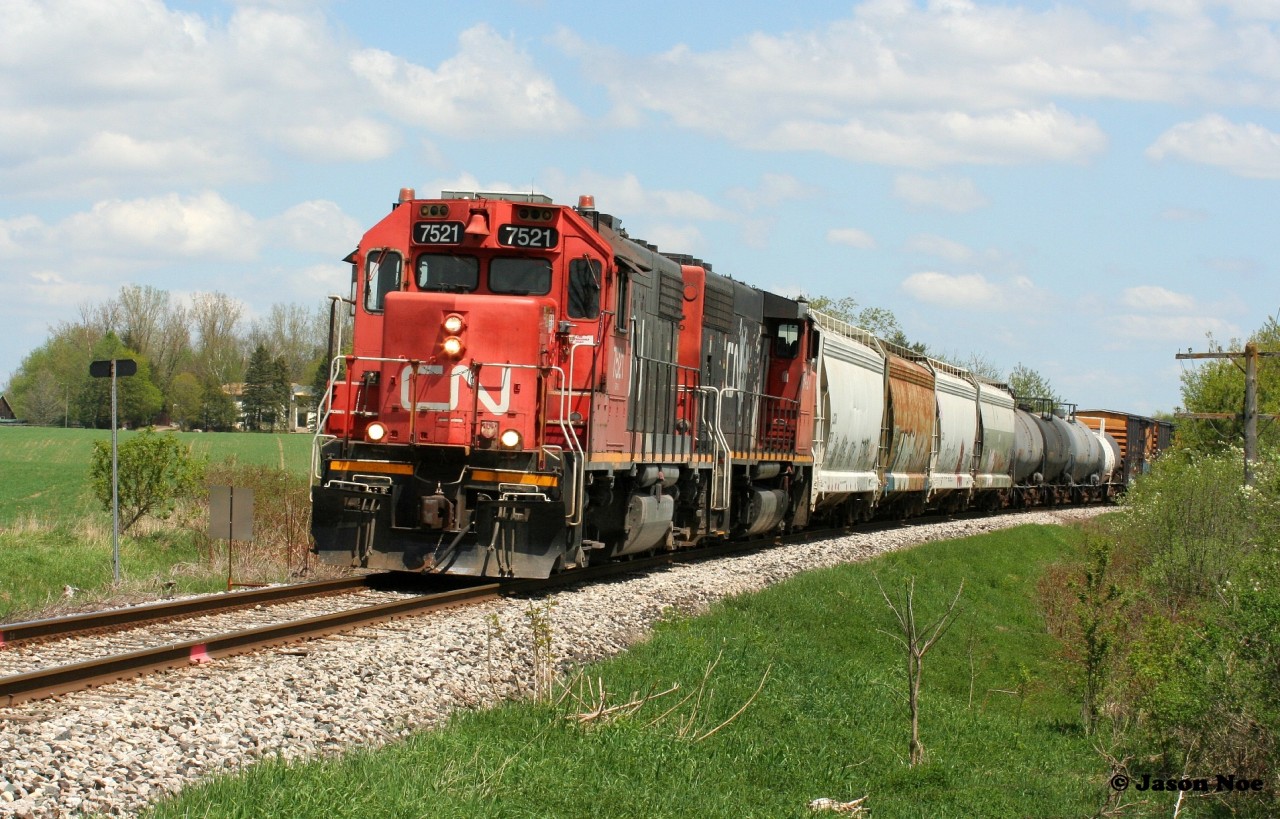 CN L568 with 7521 and 9427 sound awesome as they pass Mile 72 in Baden, Ontario heading westbound to Stratford on the Guelph Subdivision.