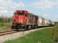 CN L568 with 7521 and 9427 sound awesome as they pass Mile 72 in Baden, Ontario heading westbound to Stratford on the Guelph Subdivision.