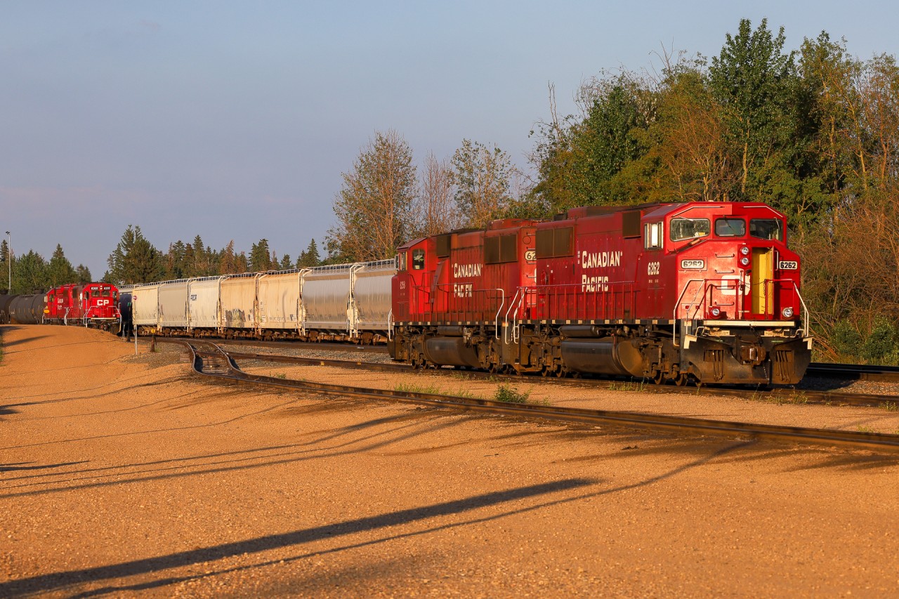 The sun sets on another beautiful June evening in Alberta, as CP 6262 and CP 6258 await the yard job to clear prior to starting their shift.