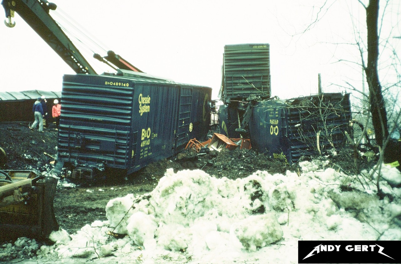 CP crews work to clear the derailment of CP train 916 that happened between Galt station on the Galt Subdivision and the curves before the westbound Orrs Lake mile sign during winter 1986. The photo was taken with permission from the homeowner whose property backed onto the line. 

Thank you to RonaldB for the information on the CP derailment from my previous post.