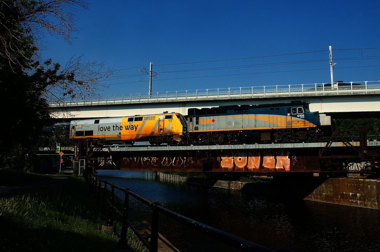 VIA 33 from Quebec City uncommonly has two units up front (VIA 6408 & VIA 912) as it crosses the Lachine Canal.