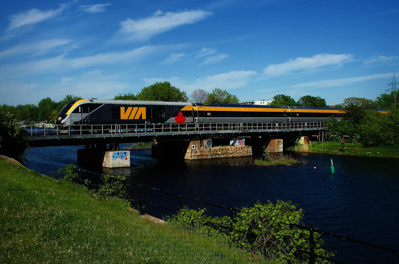 VIA 37 for Ottawa has a Siemens trainset as it crosses the Lachine Canal.
