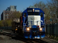 CN 500's power backs up to grab its caboose before picking up its cars in the Port of Montreal.