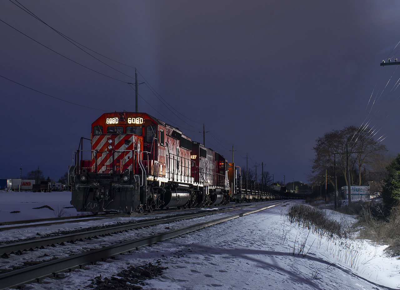 Earlier this year CP ran a CWR train along the Galt Sub dropping rail in various locations before continuing south down the Hamilton Sub.  While working their way east, the consist was left tied down on the Killean Storage Track on Galt's east side one evening giving local photographers the opportunity for night shots of the London-built SD40-2.  With the time change 'springing ahead' during the night, I was afforded an extra hour of darkness in the morning, with just enough time to grab a few shots after work before the sun came up.