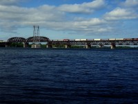 CP 8035 is all by its lonesome as it leads CPKC 229 over the St. Lawrence River.