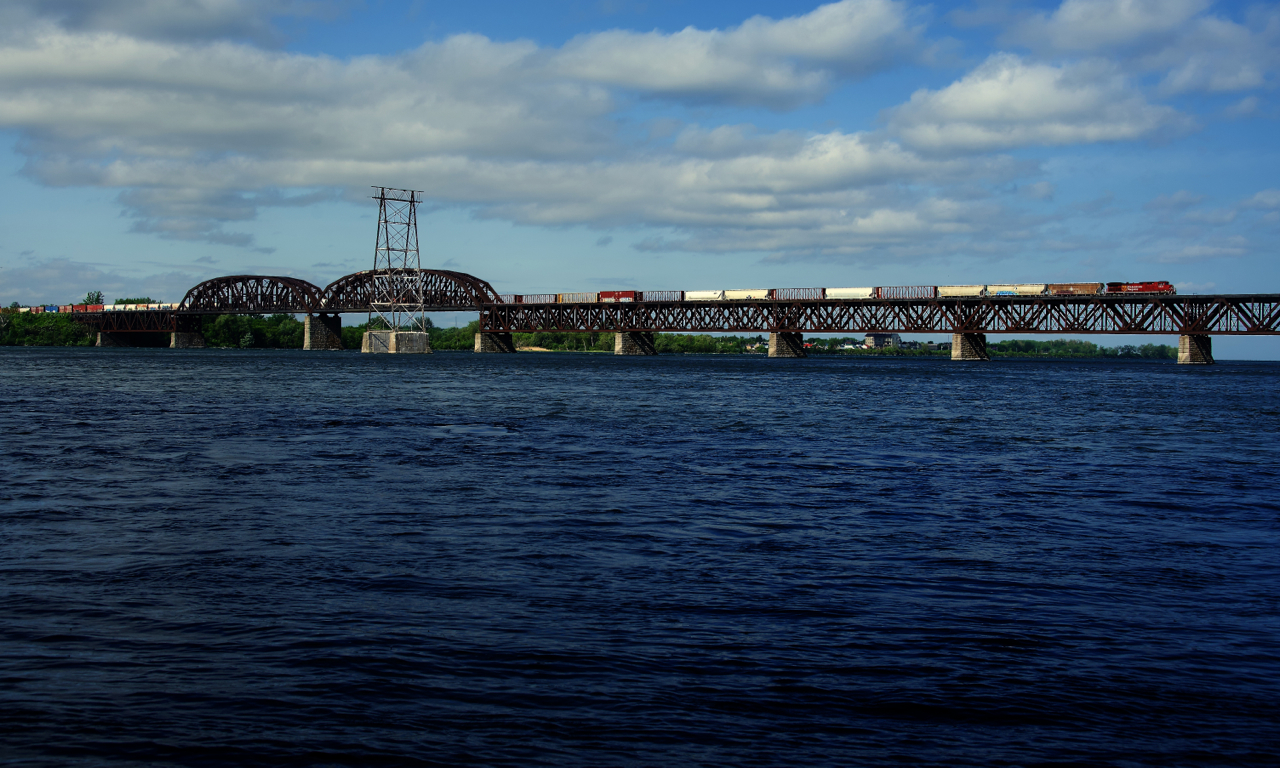 CP 8035 is all by its lonesome as it leads CPKC 229 over the St. Lawrence River.