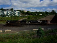 NS 8082 & NS 4443 lead a 78-car CN 529, heading towards its terminus of Taschereau Yard a few hours later than normal.