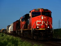 CN 321 is heading west with a pair of DC units on a lovely spring evening.