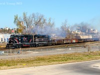 Having stood down for an eastbound CN freight and the westbound Canadian, a westbound CEMR crew destined for their Carman Sub operation, utilizing SD40-2W 5310 and SD40-2 5396 with 9 gons in tow put on a bit of a show sending plumes of diesel exhaust into the sky at the west end of CN's Fort Rouge yard.