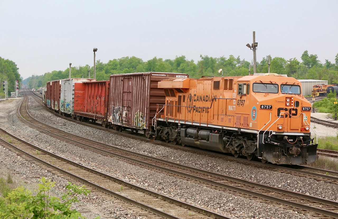 It is unfortunate that its KCS travel companion was dropped in Windsor, nevertheless this is only the second time I have photographed this unit so it was a worthwhile drive. After dropping half of its train near Mountsburg, solo CP “Every Child Matters” GEVO 8757 makes its way into Guelph Junction to drop some cars before returning to its train, and onto Toronto.
