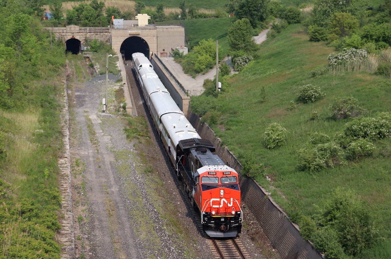CN 3309 leads a six car executive business train through the Paul M. Tellier tunnel into Sarnia, Ontario.