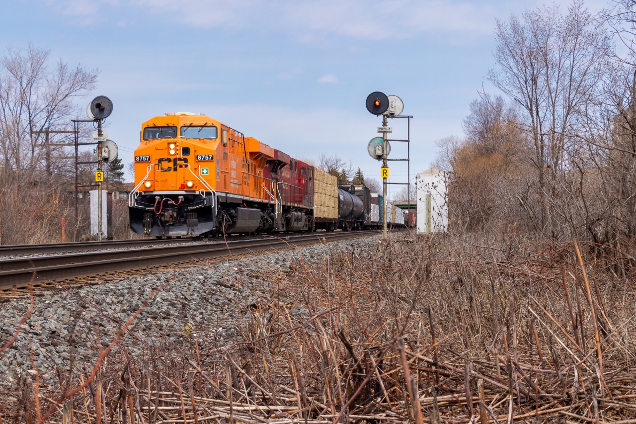 CP 231 descends into the Don Valley after departing Agincourt yard a few miles east of here with nearly 10,000ft of manifest for London and points beyond. The leader is CP 8757, the locomotive painted in orange to represent Orange Shirt Day in Canada. CP 8894 trails. Every Child Matters, every day of the year.