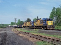 A trio of GP 38-2 locomotives handles the traffic for Rouyn-Noranda on a nice sunny morning. The train is passing thru Kirkland Lake roughly where the station used to be. These units, along with SD40-2s  used to be the standard power before the railroad got into the SD75I locomotives in mid-1999. Power on this train is 1806, 1804 and 1802.