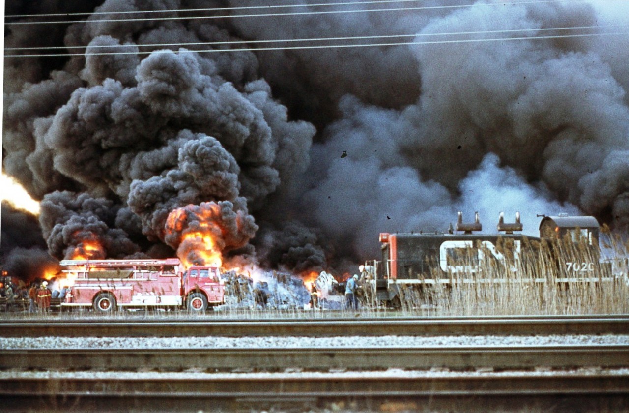 A spectacular blaze that all started with a grass fire, about seven warehouses went up in flames next to the CNR Oakville yard on April 25, 1978. My dad took us to see it (from a distance of course), and I remember watching huge steel drums of chemicals blasting into the air! Even a fire engine was lost on the Chartwell side of the road. Here is CN engine 7020 assisting crews to and from the site. I could just imagine the heat coming from that fire...