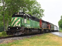 CN 580 slowly makes its way back to Brantford after doing the turn to Hagersville.  BNSF 2098 didn't attract as much attention as expected today; the crummy weather likely played a factor.  The Hagersville Sub. is currently all 10 MPH, so it's not difficult to get multiple photographs of the train.  I'm sure the small group of foamers chasing the train provided entertainment for the crew on an otherwise mundane day. 