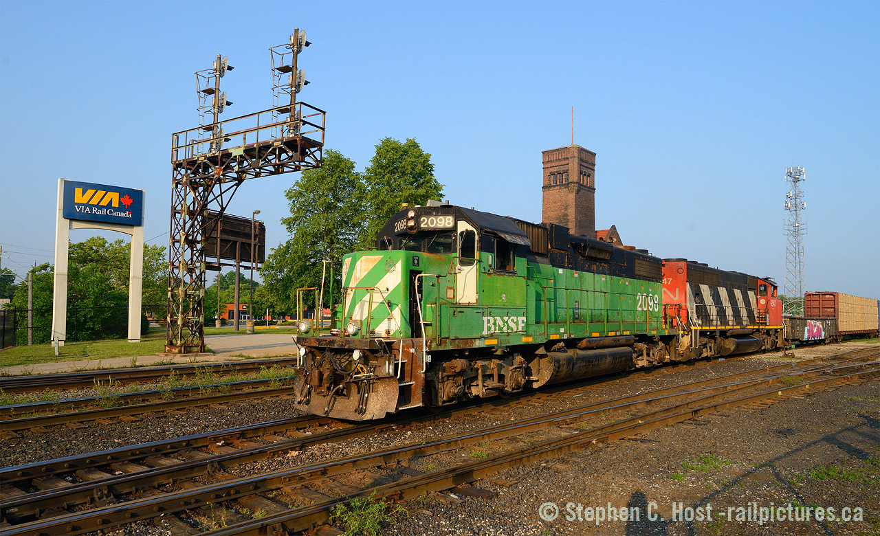 If someone told me 6 years ago that CN would take back the Hagersville and BNSF locomotives would be on it - I'd tell you this is either a railfan's fantasy or BNSF has finally merged with CN. The merger still hasn't happened, but as of the time I write this there are now 8 or 9 BNSF GP38-2's or thereabouts (some may be 35's or 39's) on the CN system with more coming every week. Nobody knows how many are expected, no one really knows why except Management, and they are scattered from Vancouver to Montreal, but they are assigned to locals on a HPH basis meaning at this time CN does not own them. Basically, it's foreign power on loan to repay horsepower debt BNSF owes to CN. Based on this it appears summer 2023 is the year of BNSF on CN locals. Have any western or Montreal/Eastern folks seen them yet? 2098 assigned to L580/581 in Brantford brought a few dozen folks out, two dozen were out for yesterday's run - pictured switching the yard at sunrise at the VIA station. There was one (2316) assigned to Toronto a couple weeks ago but it only lasted a few days.