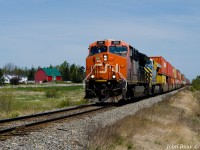Seen here is the head-end of CN Z120 on May 31st 2023, at Brookfield NS on the Bedford sub with CN 3101 and CN (ex-CREX) 2761 and 534 axles (DPU CN 3020 is mid-train.) This was part of a day out with Halifax area railfan Geoff Doane where we chased this train from the New Brunswick border close to 140 km to south of Truro. In that distance we shot this train six times then had lunch in Truro and lucked into an encounter with CBNS train 305 arriving in the yard there. This was our final location for Z120, about 2 miles north of the Canada Cement spur.