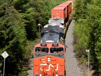 Seen here is the head-end of CN Z120 on May 31st 2023, going under the highway 142 overpass at Salt Springs NS with CN 3101 and CN (ex-CREX) 2761 and 534 axles (DPU CN 3020 is mid-train.) This was part of a day out with Halifax area railfan Geoff Doane where we chased this train from the New Brunswick border close to 140 km to south of Truro. In that distance we shot this train six times then had lunch in Truro and lucked into an encounter with CBNS train 305 arriving in the yard there, and finally shot CN L507 five times all the way to Painsec Junction just a few kms short of Moncton NB.