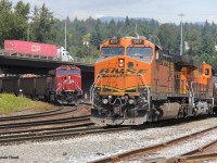 Busy moment at Braid Jct. BNSF 607-BNSF 8009 wait for their turn to cross the Fraser River into Brownsville Yard in Surrey. Meanwhile, a CPKC coal train heads west with CP 8029 as a DPU (in the typical 1-1-1 GE setup) (side note: it is very rare to have power other than a CP GE on these coal movements). The BNSF will still need to wait for a northbound/westbound Amtrak train and a CN potash train (units visible above the CP coal cars) before taking the bridge.