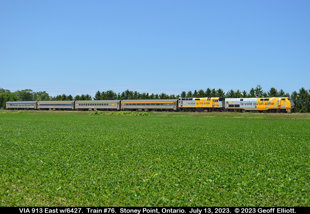 VIA "la voie qu'on aime" units #913 and #6427 lead eastbound train #76 as it approaches Stoney Point, Ontario on July 13, 2023.  This is the first time I've been able to catch 2 "Love the way" units on the point of a VIA train as any other time there was a pair on a train they were always push/pull.  Trying to get as many shots of the old power while it's still here and getting a pair together is a nice change.  :-)