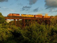 CP 6028 and 3747 are in the lead of GPS-16 as it passes over E.T Seton Park in Toronto's East end.