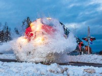 The day after a winter storm hit the area with heavy snow and freezing rain, CN train 594 cruises along and hits a snowbank at Passekeag, New Brunswick. Not the biggest poof I've gotten, but I'll take it. 
