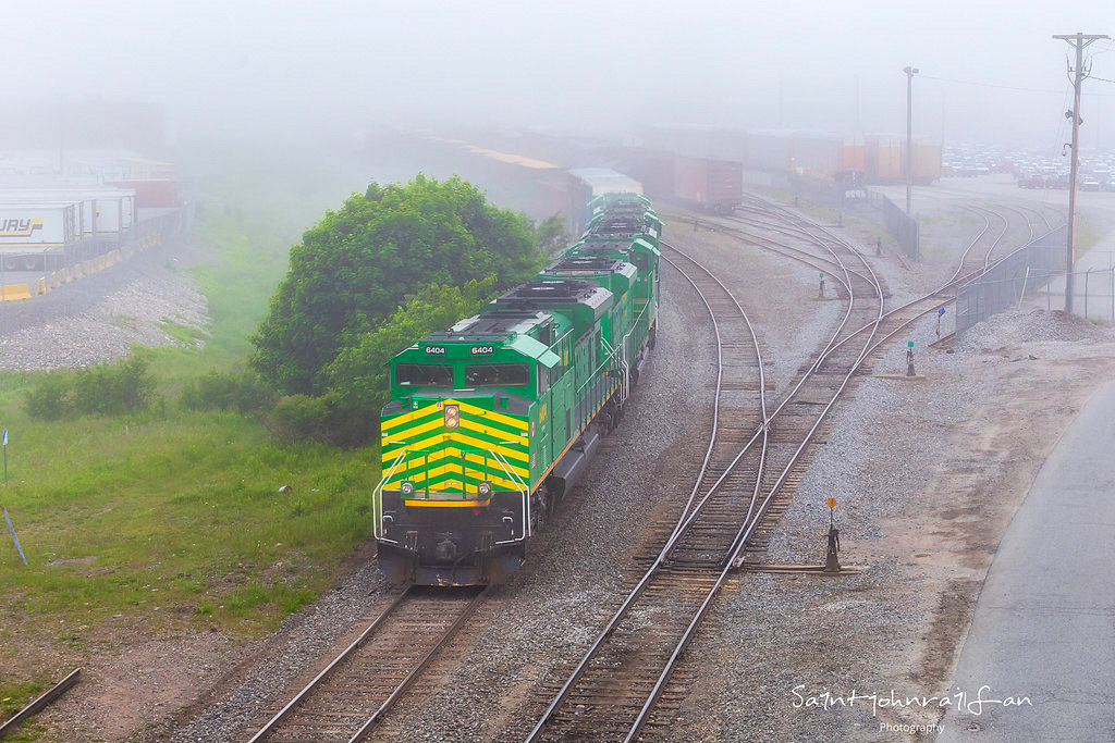 NBSR train 120 pulls through the yard and is about to do their switching before heading to the shops. There is a rail yard down there, I swear...