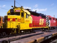 Before returning back to Redwater on a visit to Edmonton, I took a quick look at the CP South Ed. diesel shops and found this. I am putting this photo in connection with Jacob's Agincourt Diesel Shop post from Jan/88. He mentioned the ATSF 3600, which brought me to this picture from the summer of 1987. The 3600 is paired with CP 3101. Behind are another pair the 3012 with an unknown GP38. To the left is CP 1564. SF 3600 has the name Argentine placed between the F and the 62/15 on the side of the frame. If there is a favourable way to have cars parked in front of the units, I hope this is it. :^)