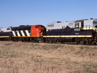 A unit train of 55 empty hoppers had just passed through Egremont on the way north to pickup 35 loads. One of the more unusual ABA sets with a short nosed GP9 at each end. Cab 79258 at the rear, time was 8:00.