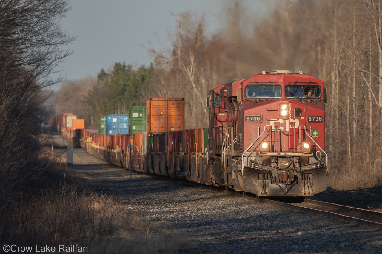 Spring has not yet sprung as CP 133 runs the grades outside Smiths Falls.
