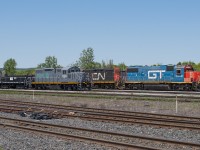 GTW 5849 and CN 4136 rest alongside LDSX 7224 and LDSX 269 at Stuart Street Yard in Hamilton Ontario.  The LDSX set was on its way to GIO Rail in Welland but was set off by 421 at Hamilton for some reason to be lifted the very next day by another 421.  The railroad works in mysterious ways but it worked out for this railfan.