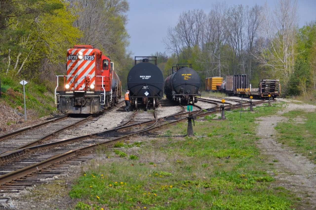 In an era of GP20ECOs dominating CP local freights, railways like the OSR who still use their better looking predecessor, the GP9U, are becoming more and more appreciated. OSR 8235 looks stylish in CP Action Red while pulling into Tillsonburg Yard.