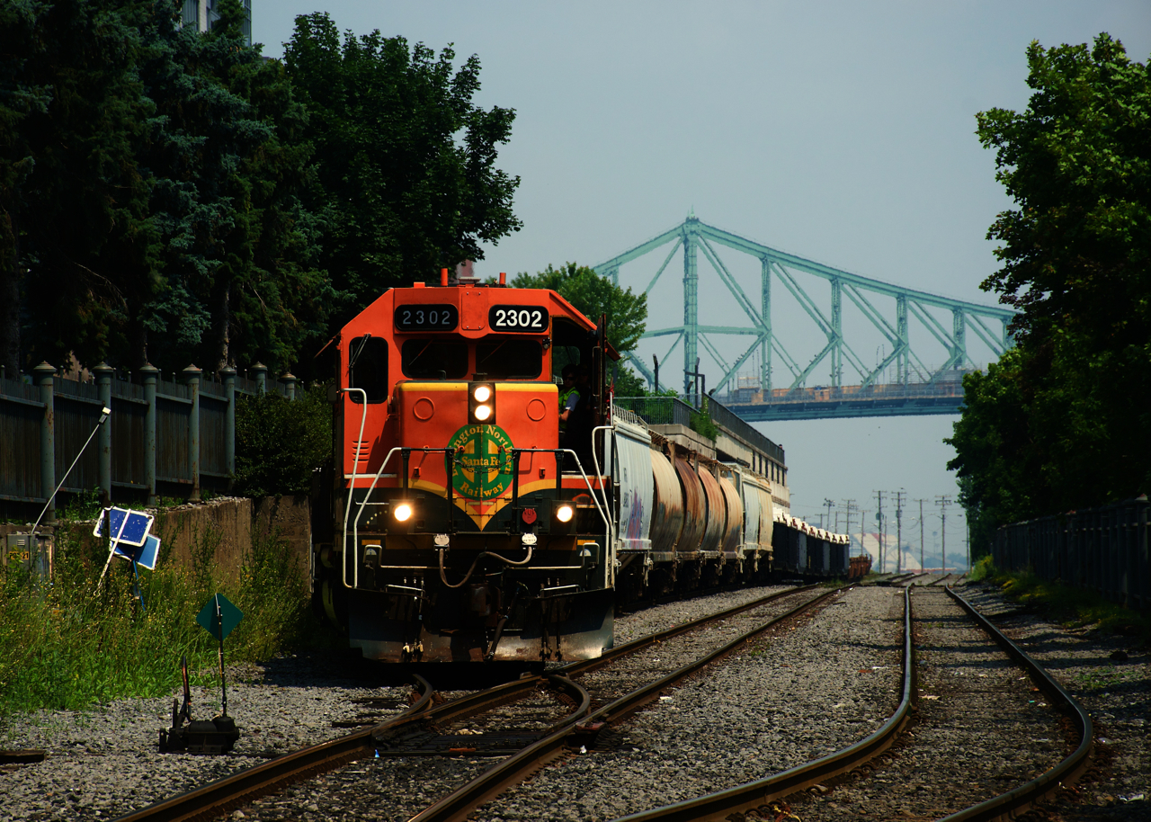 After getting permission from the Port of Montreal yardmaster and security to leave, CN 500 is on the move with a BNSF leader.