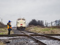 Conductor Flynn protects the crossing of CN's Cayuga Subdivision, giving OSR's business train permission to depart the Wabash Transfer for the end of steel at Talbot Street.