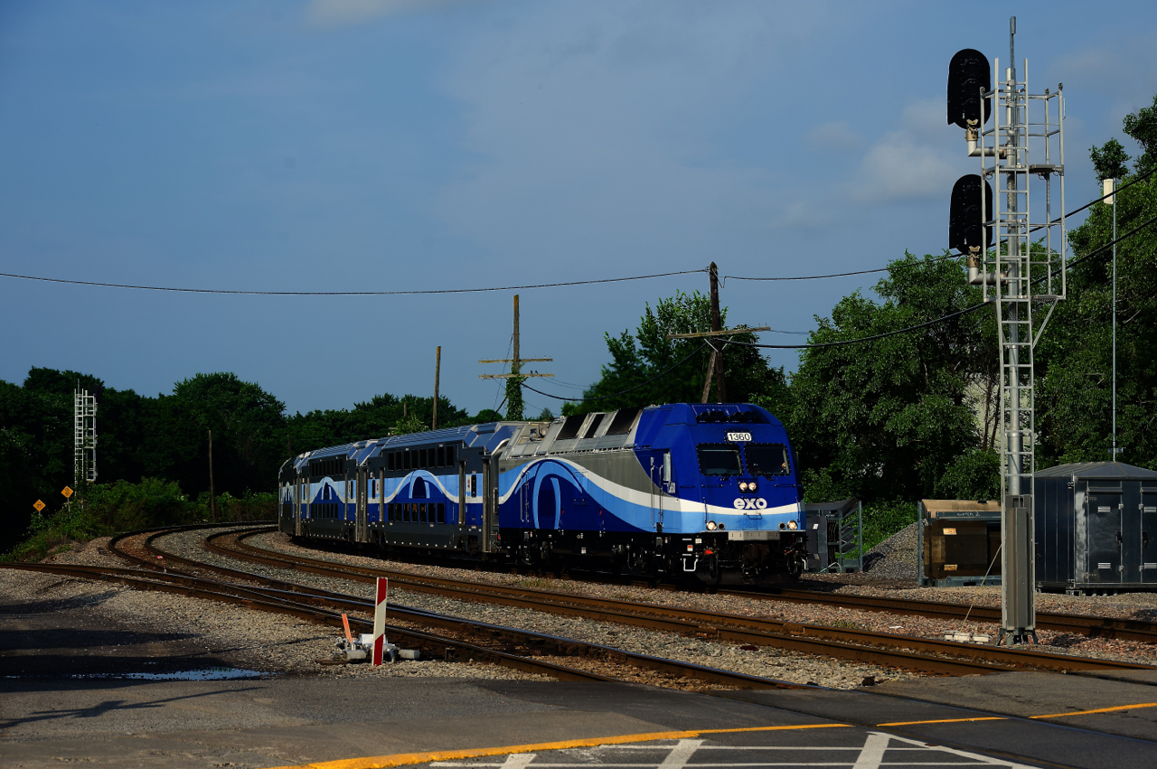 EXO 180 from Saint-Jérôme is about to cross Westminster Avenue and arrive at Montreal West Station towards the end of the morning rush hour.