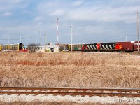 In September 2011 Ford would close their St Thomas assembly plant, ceasing 44 years of producing cars in Elgin County. A little more than two years prior to the closure, on a quiet Monday morning I found CN GP9RM's 4134-4140 resting outside the yard office at Talbotville awaiting their next call to service at the nearby plant. 