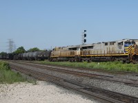 Dressed in CitiRail paint scheme, two former CREX locomotives now numbered CN 3916 and CN 3977 are getting up some speed as they enter the south track of the Halton Sub. at Burlington West.