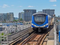 On July 11, 2023, one of Canada Line's many trains entered Bridgeport Station, near YVR Airport.