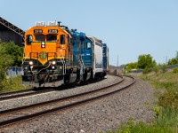 BNSF 2316 and CN 4910 pull 3 cars southbound down the Metrolinx Newmarket sub after working a few industries along the line. BNSF 2316 was in Toronto to repay horsepower hours, and it was the first one around. It has since gone back to the USA (maybe to BNSF, I'm not sure) but there are still some others wandering about in various CN yards across the country. 