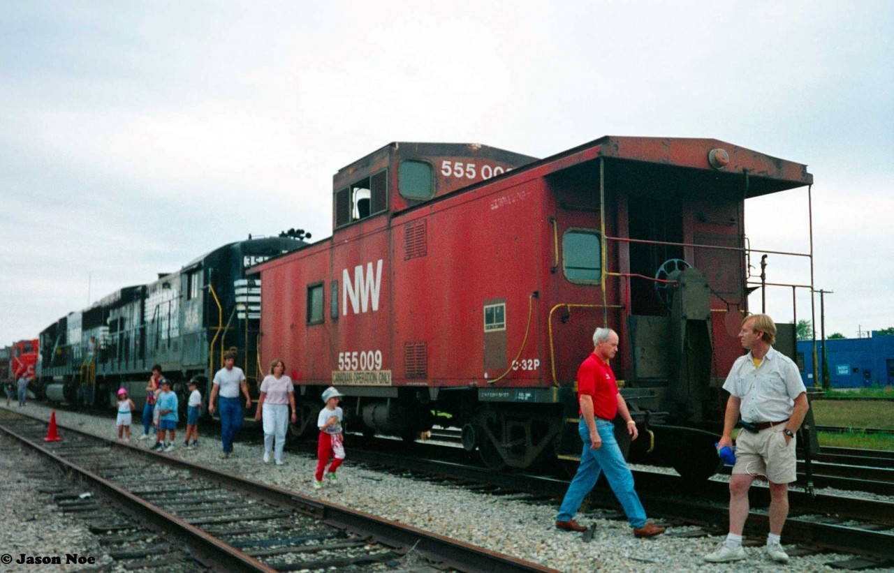 N&W caboose 555009, Norfolk Southern 6689 and 3516 along with CN 4114 were on display in St. Thomas, Ontario during the city's Railway Day’s event held during August 1993.