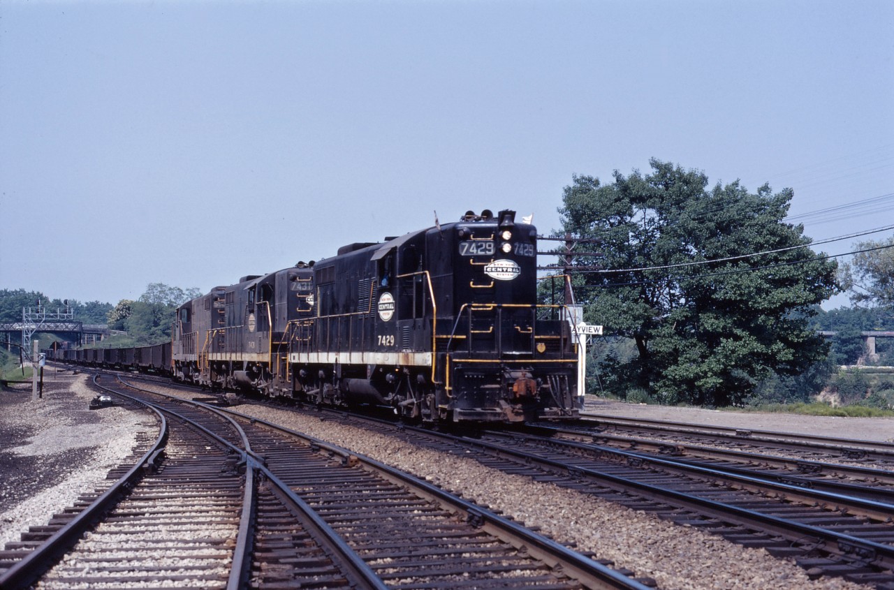 Having come in to CP's Toronto Yard overnight, these three Geeps are making a quick turn to the TH&B's Aberdeen Yard with the "Starlight" before returning stateside with the "Kinnear" tonight. Five months after the Penn Central merger, units 7429, 7431 and 5820 are still wearing New York Central colours. By early 1971, all were wearing Penn Central black.