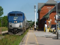 Amtrak Maple Leaf sitting at the Niagara Falls Via Station with the usual Genesis locomotive and 5 Amfleet coaches.