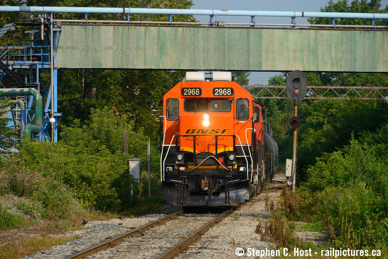 I never thought I'd see a foreign unit on our area Branchlines. This one seems quite a home given that it's not too different than the G&W Orange that plied these rails for about a half decade when the first Orange units arrived in 2014. BNSF 2968 is also one of the oddest ones on the "BNSF Borrowed" CN roster: A 567 powered (rebuilt) and given a turbo, now a GP39V as per it's 12/1990 VMV Paducahbilt (NRE) rebuild. The air conditioning must be a welcome relief for the folks in the cab this summer. This unit was in Oakville earlier this week but Oakville kicked both BNSF's to the curb as fast as they could as they didn't like them. Kitchener did the same too. Can anyone say hot potato? Feel free to give your guesses why below.