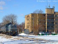 <a href=http://www.railpictures.ca/?attachment_id=49136 target=_blank> One of my favourite units in Sarnia, but not so often photographed, was Esso 7290</a> and after many years of storage not long after this photo was taken by me in 2009, it was repainted and repurposed for GIO Rail. It was on my bucket list to find in Niagara, so it took a chance visit in February to try my luck on what's running on the GIO's Trillium Railway division. As luck would have it, I drove over the Canal sub near WH yard and lo and behold, 7290 my prime target was coming toward me on what turned out to be an odd move: 7290 ran past WH yard light power, took the  PCHR switch, ran all the way down to Macey yard to make a lift, then take the cars back to Verbio for switching. This gave me quite a bit of ground to cover and many photos. Pictured is the 2 car train heading back to Verbio on the former CNR Dunville subdivision, on Mooney and Klaucker's territory :). More to come.