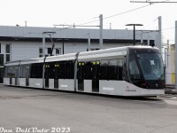 <i><b>Finch West meets the Future:</b></i> TTC 6514, a brand new Alstom Citadis Spirit LRV, sits inside the new Finch West Maintenance and Storage Facility in the North York area of Toronto. The "15" taped inside its front window denotes this as the 15th car of the order of 18 (6500-6517). The small fleet of 4-car articulated sets are owned by Metrolinx and are to be operated by the TTC on the nearby yet-to-be-opened Finch West LRT line (currently undergoing testing in some parts, and construction in others). These are different from the LRVs to be used on the Eglinton LRT line: the 6200-series Bombardier Flexity Freedom units.<br><br><i>* Note, photo taken from public property outside with a very convenient telephoto lens.</i>