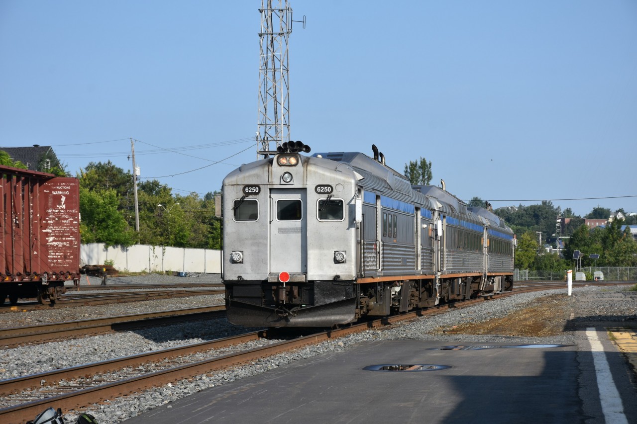 Budd RDC's!!! VIA #185's equipment for the Sudbury to White River train is slowing backing into the station track on a clear blue, sunny morning in Sudbury, ON. 
The overcast and rainy weather from the evening before has moved out, and the great weather seen in this pic will stick around for my entire two-day journey from Sudbury to White River and return.