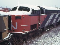 Sometime only the remains are left. The stripped hulk of CN 9318 is in CN's Reclamation Yard in London, Ontario on November 30, 1968.
She was a CLC CFA16-4.