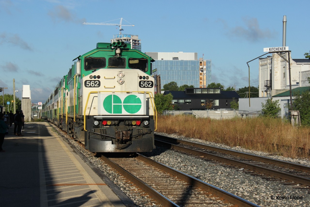 On a beautiful summer morning in 2022, the early morning GO train from London is about to make its stop at the Kitchener VIA+GO station with its usual double-header classic cab power.